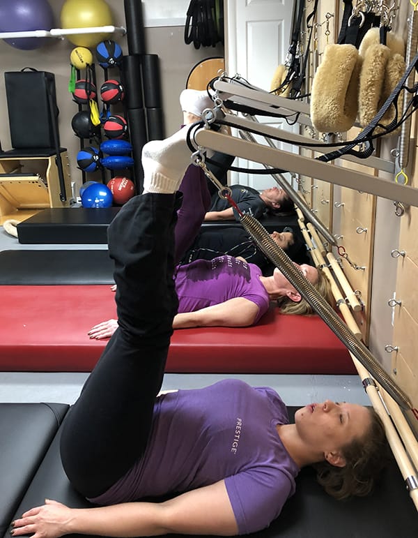 Women-only Pilates class at Precision Pilates and Wellness