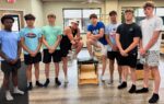 A group of high school swimming team athletes getting ready for the or Pilates class in Nesconset