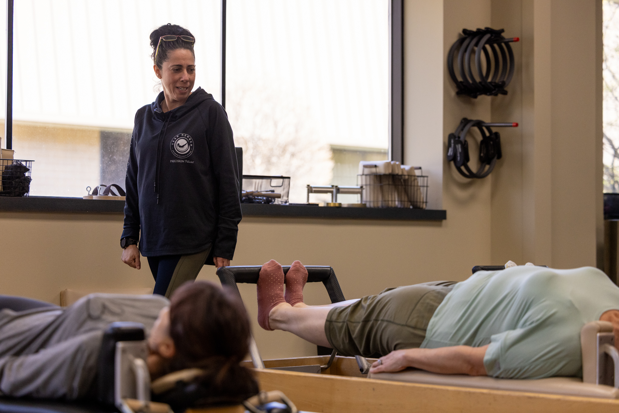Precision Pilates Instructor Teaching Osteosmart Class in the Reformer
