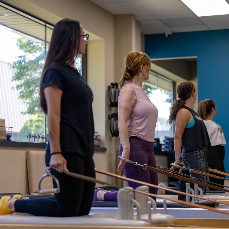 Woman doing Pilates session 10·20·30 New Year Reset Challenge