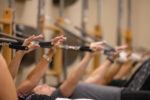 Precision Pilates Clients Using The Tower