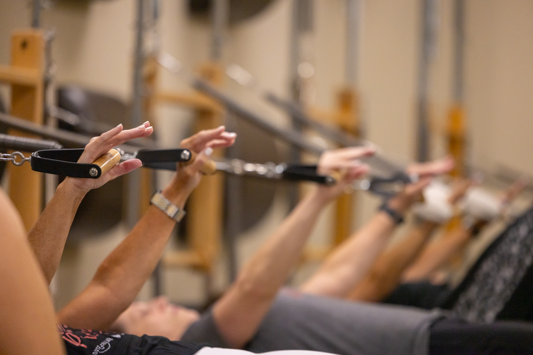 Precision Pilates Clients Using The Tower